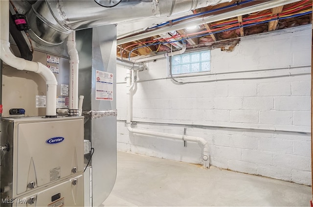 basement featuring heating unit