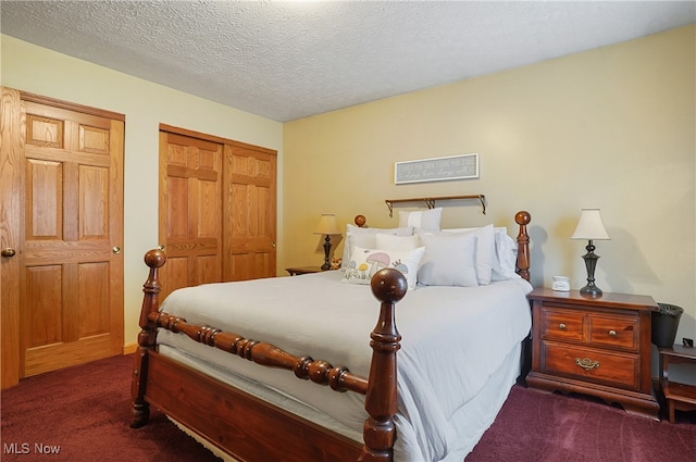 carpeted bedroom with a textured ceiling