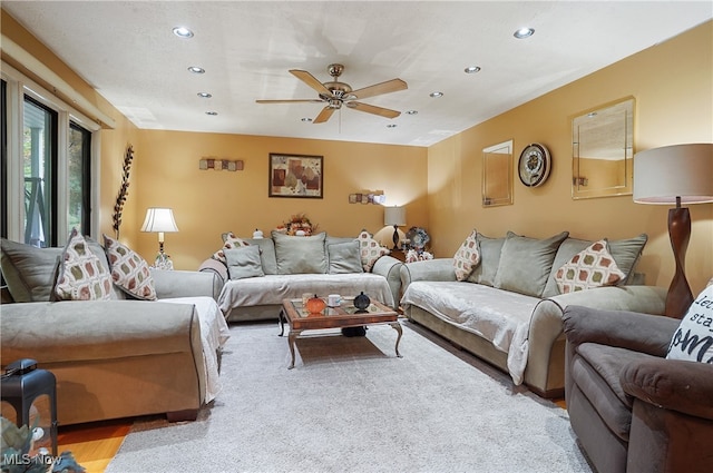 living room with ceiling fan