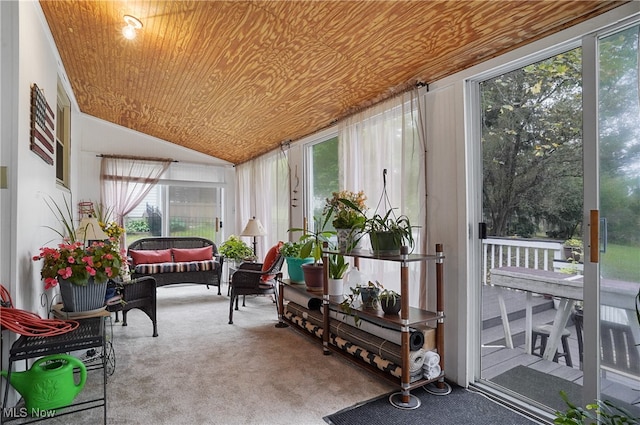 sunroom featuring wood ceiling and vaulted ceiling