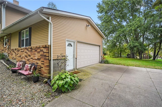 view of home's exterior with a lawn