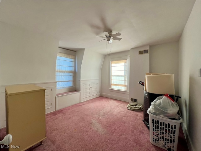 miscellaneous room with ceiling fan and light colored carpet