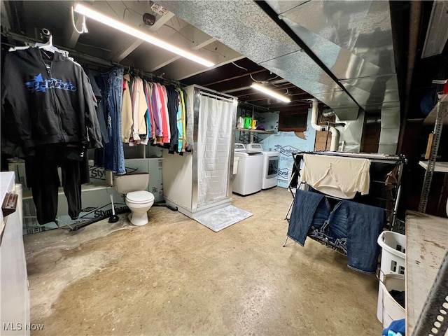 basement featuring washing machine and dryer