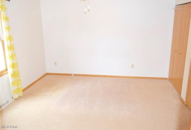 empty room with light carpet