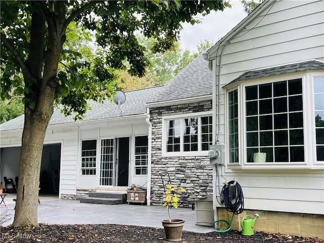 rear view of property with a patio