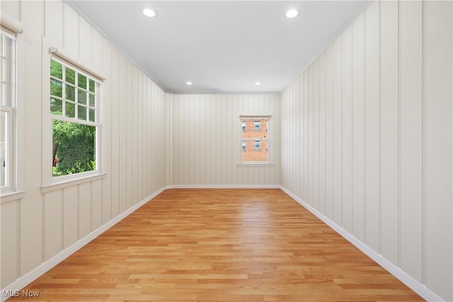 empty room featuring recessed lighting and light wood-type flooring