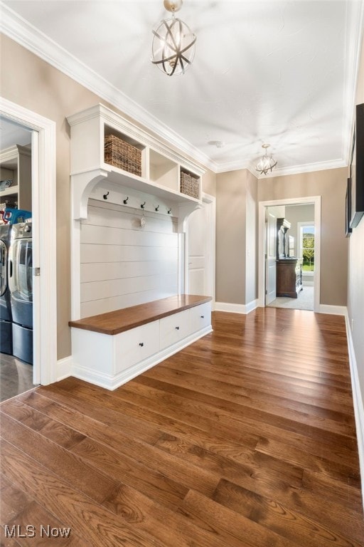 mudroom with a notable chandelier, washer and clothes dryer, and dark hardwood / wood-style flooring