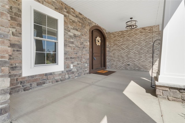 entrance to property with covered porch