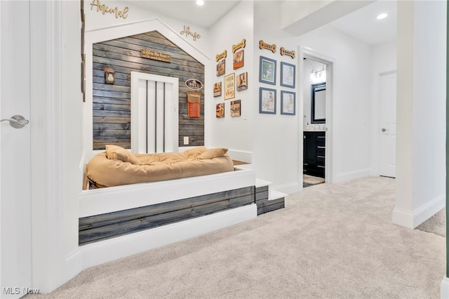 interior space featuring baseboards, recessed lighting, and light colored carpet