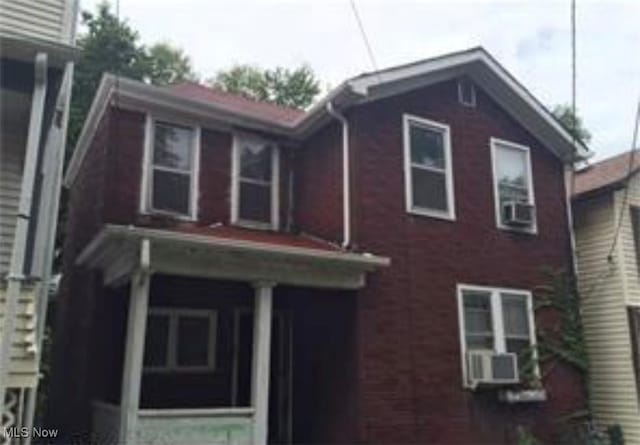 view of side of home with cooling unit