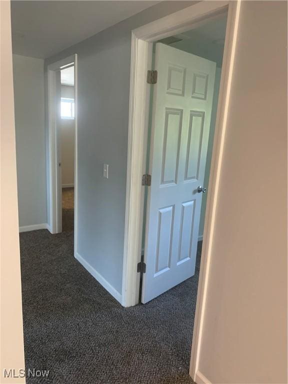 30436 State Route 172, East Rochester, OH 44625 - hallway with dark carpet and baseboards