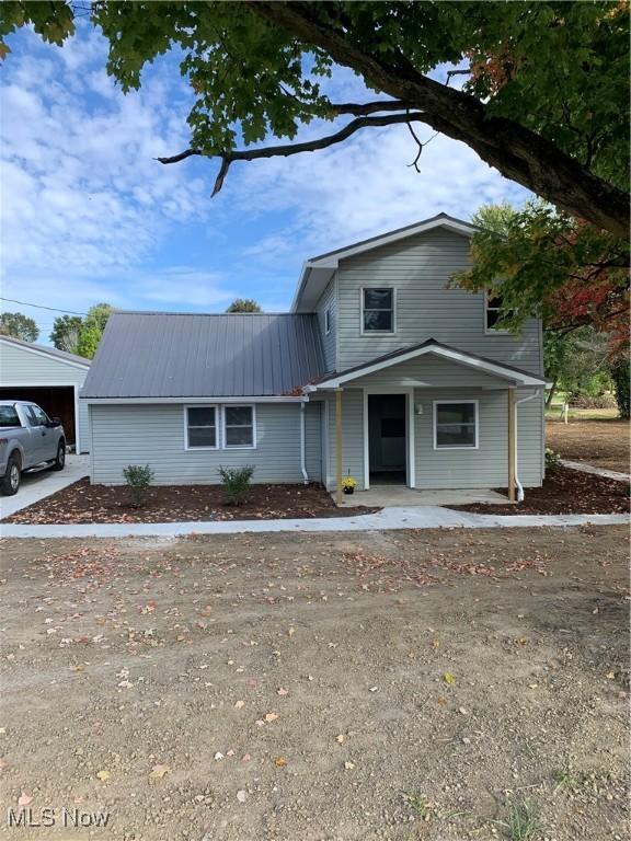 30436 State Route 172, East Rochester, OH 44625 - view of front of house with metal roof