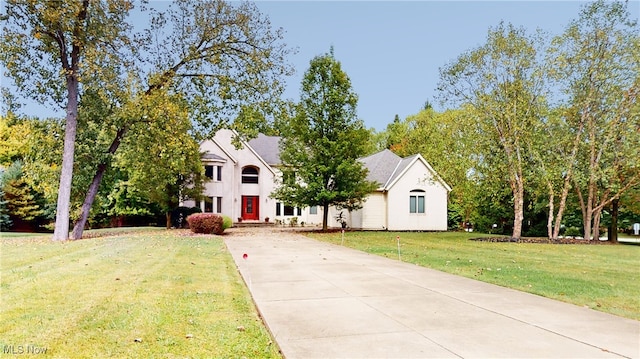 view of front of property with a front lawn