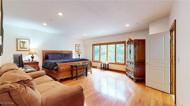 bedroom featuring light hardwood / wood-style floors