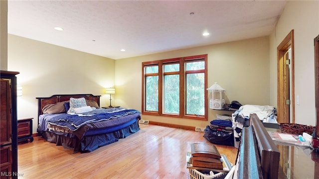 bedroom featuring light hardwood / wood-style floors