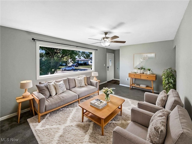 living room featuring ceiling fan