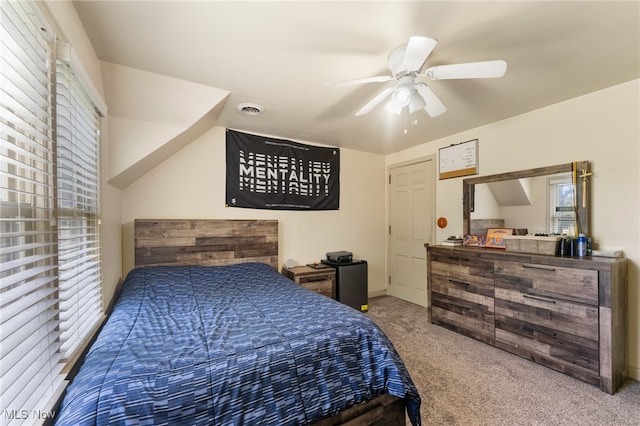 bedroom with ceiling fan and carpet flooring