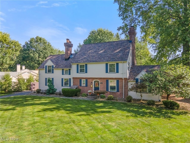 colonial home with a front yard