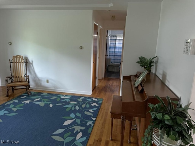 living area with wood-type flooring