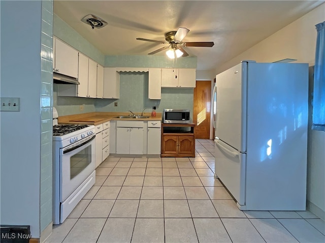 kitchen with sink, white cabinets, white appliances, exhaust hood, and ceiling fan