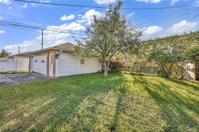 view of yard with a garage