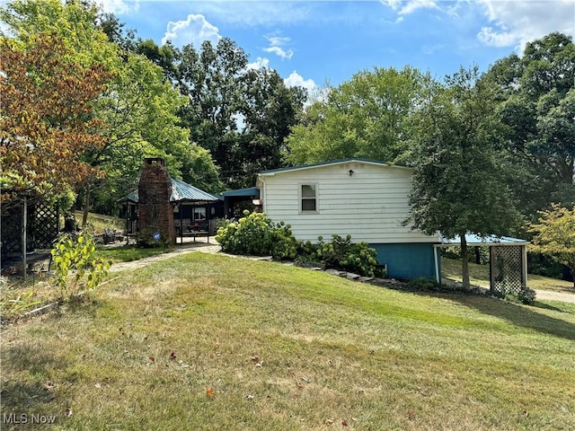 70571 Pine Hollow Rd, Bridgeport, OH 43912 - view of grassy yard featuring a gazebo and view of scattered trees