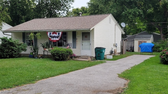 view of front of home with a front yard