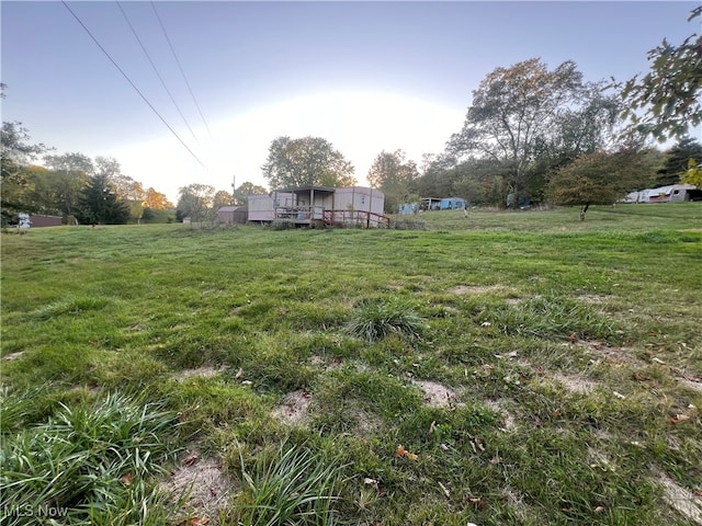 view of yard with a rural view