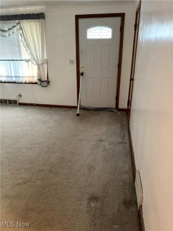 entryway with carpet