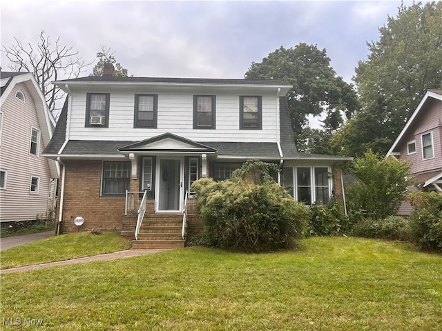 view of front of home with a front yard