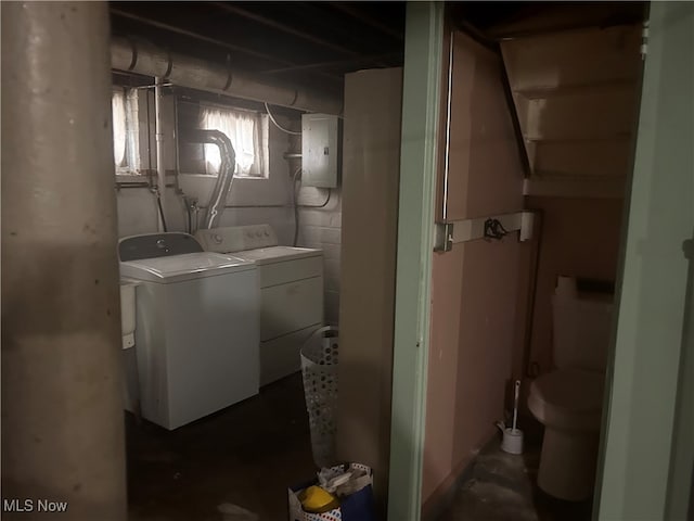 laundry area featuring washer and clothes dryer and electric panel