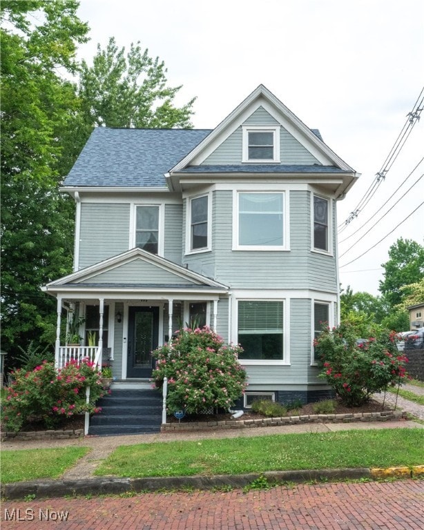 victorian home featuring covered porch