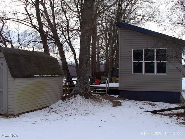 view of snow covered property