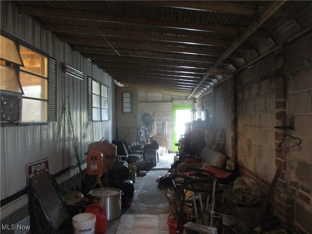 misc room with vaulted ceiling and plenty of natural light