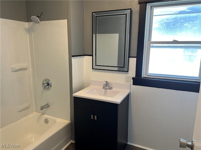 bathroom featuring vanity and shower / bath combination