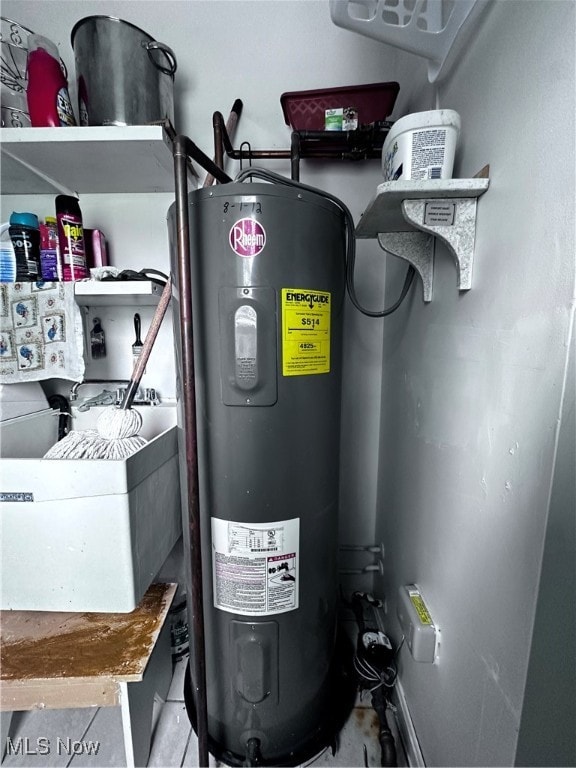 utility room with electric water heater