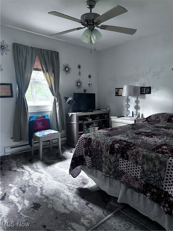 bedroom with ceiling fan and carpet flooring