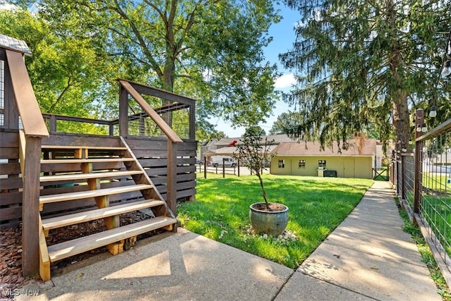 view of yard with a deck