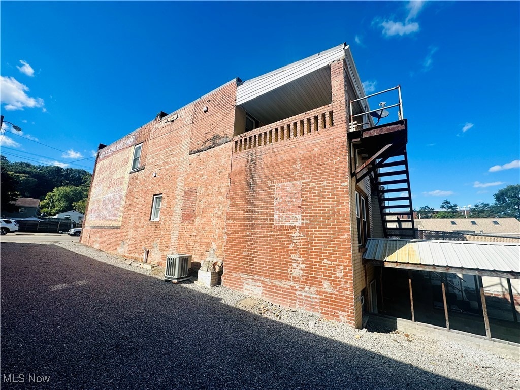 view of home's exterior featuring central air condition unit