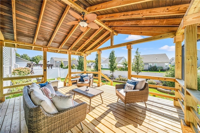 sunroom featuring wood ceiling, vaulted ceiling with beams, and ceiling fan