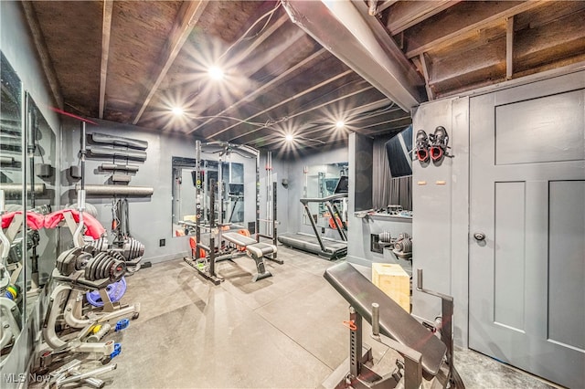 exercise room with concrete flooring