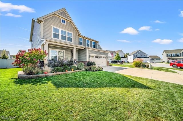 craftsman inspired home with a front yard and a garage