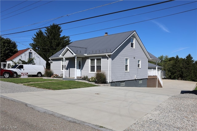 view of front of home with a front yard