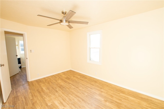 unfurnished room featuring light hardwood / wood-style floors and ceiling fan