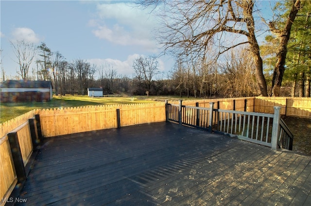 deck featuring a storage shed