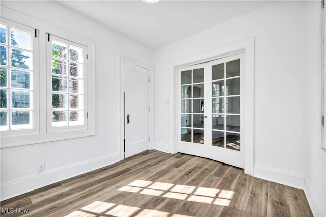 empty room featuring hardwood / wood-style flooring