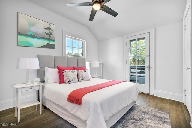 bedroom with multiple windows, vaulted ceiling, dark wood-type flooring, and ceiling fan