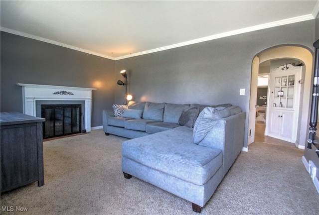 living room featuring carpet and ornamental molding