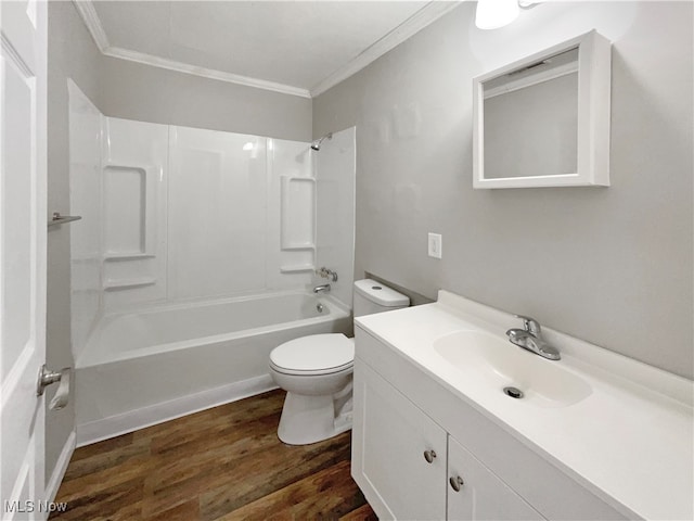 full bathroom featuring wood-type flooring,  shower combination, ornamental molding, vanity, and toilet