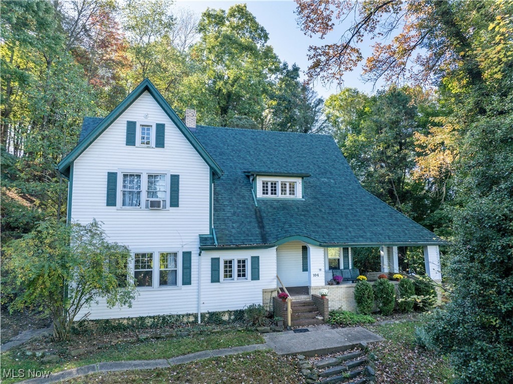 view of front of property featuring cooling unit